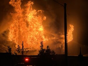 Photo of the Army Surplus engulfed in fire